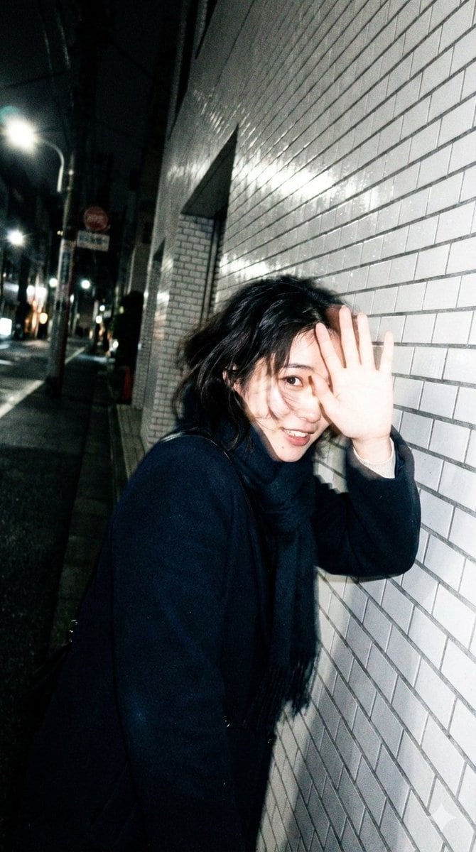 Candid, Imperfect Nighttime Smartphone Photo in Tokyo