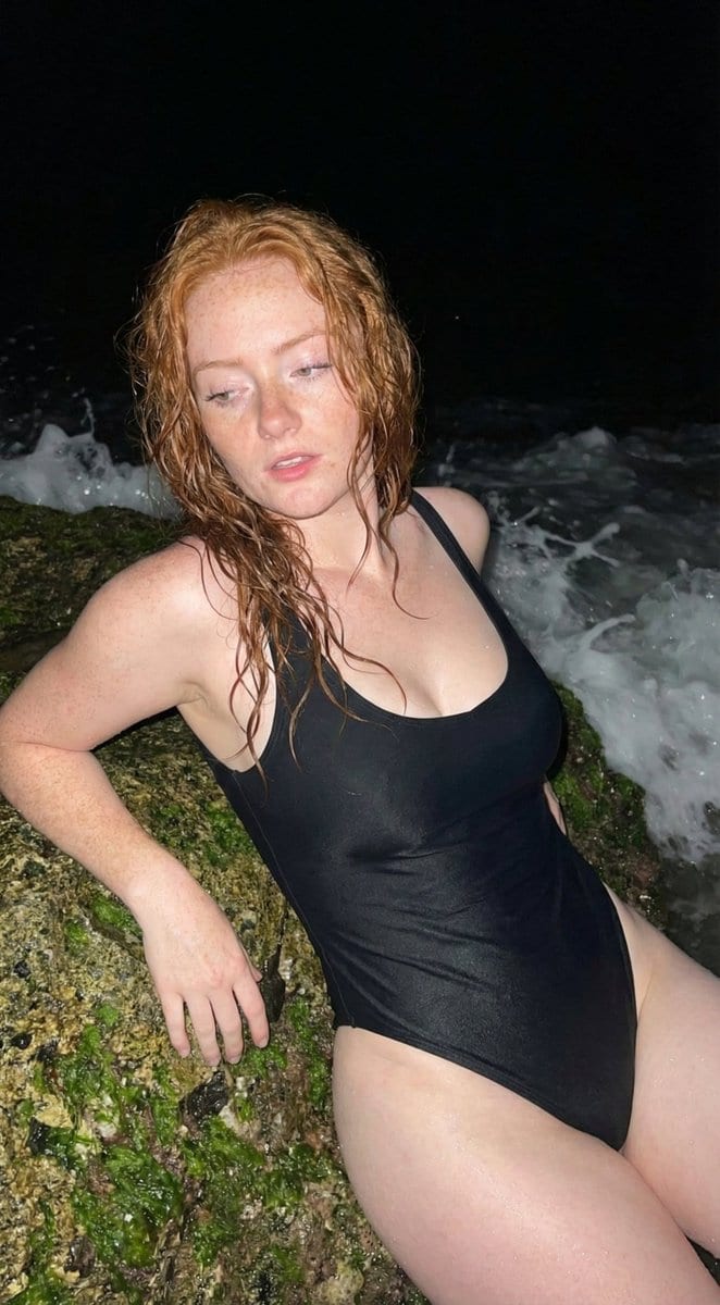 Close-up Night Beach Portrait of Woman in Black Swimsuit