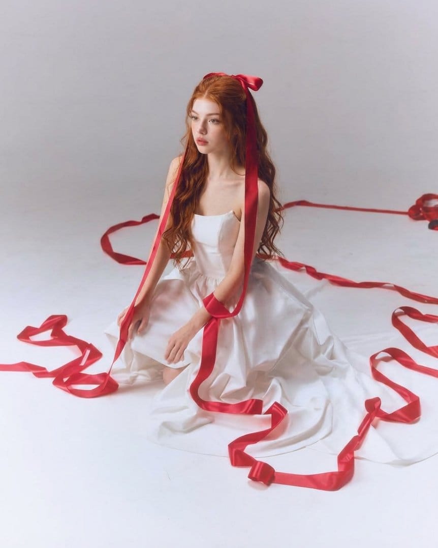 Fine-Art Studio Portrait with Red Ribbons