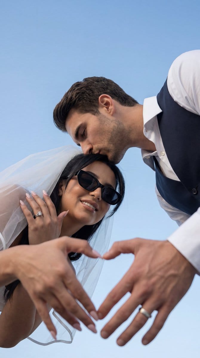 Low-Angle Wedding Editorial with Heart Hands