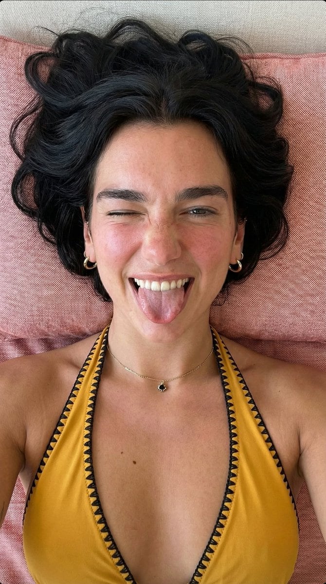 Playful Overhead Portrait with Winking Expression Prompt (Black Hair)